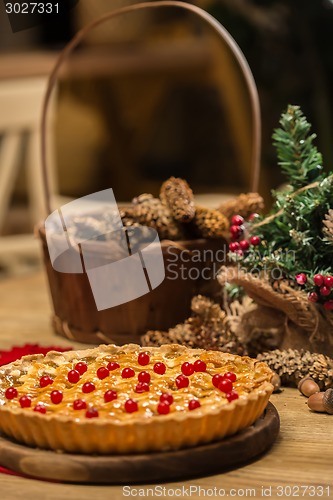 Image of Homemade christmas cake with wild berries.