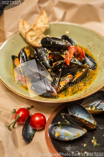 Image of Moules Marinieres - Mussels cooked with white wine sauce.