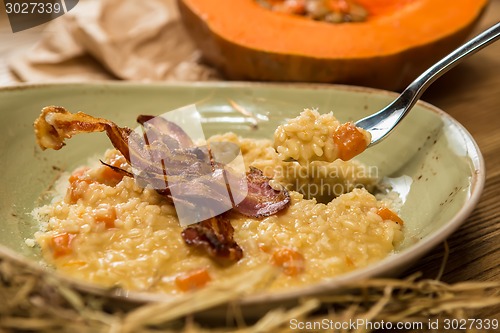 Image of Italian risotto with grilled mushrooms and bacon