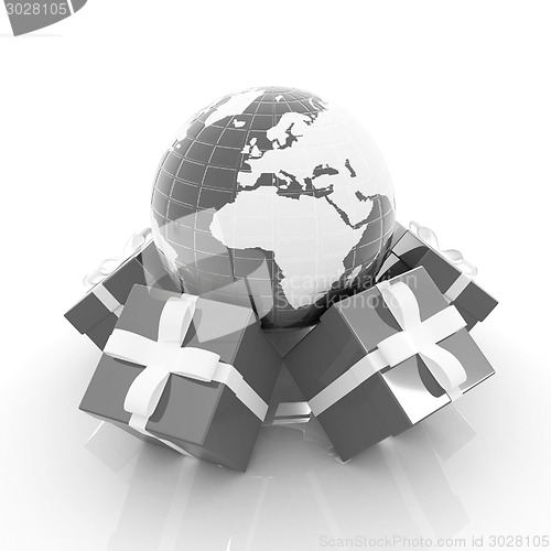 Image of Traditional Christmas gifts and earth. Global holiday concept 