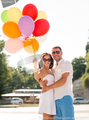 Image of smiling couple in city