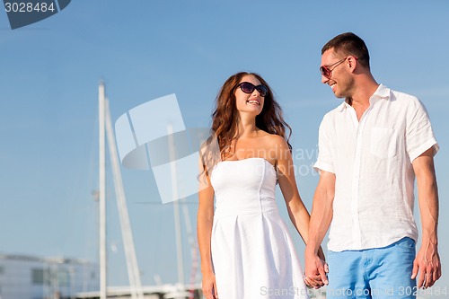 Image of smiling couple in city