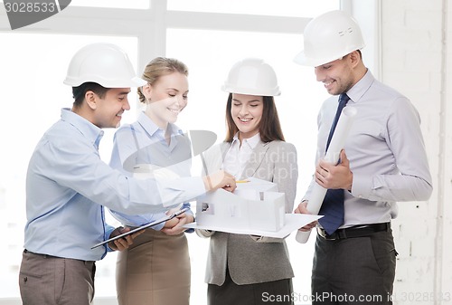 Image of happy business team in office