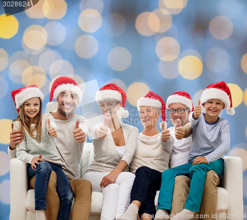 Image of happy family sitting on couch