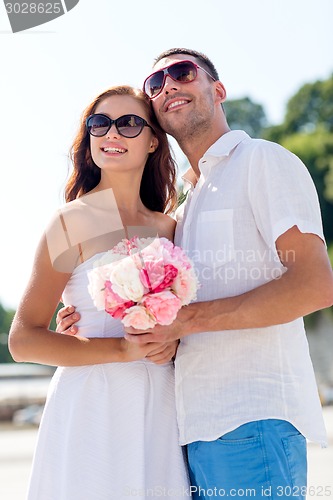 Image of smiling couple in city