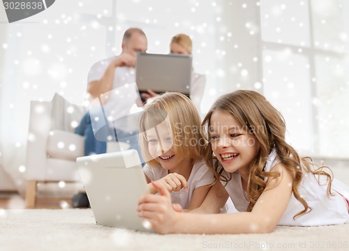Image of happy family with tablet pc computers