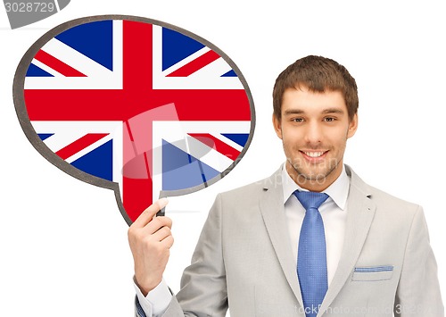 Image of smiling man with text bubble of british flag