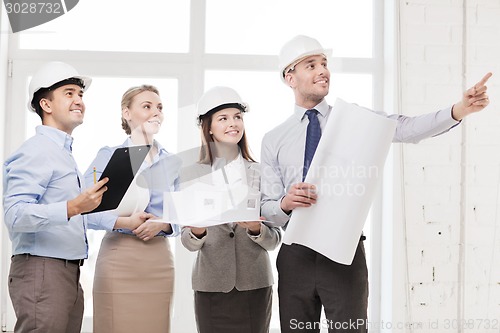 Image of happy business team in office