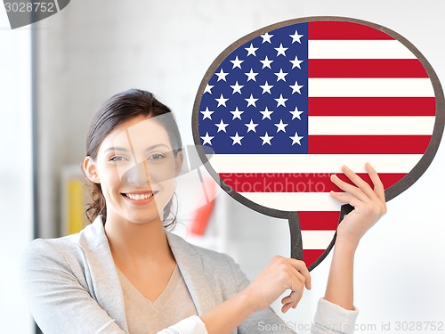 Image of smiling woman with text bubble of american flag