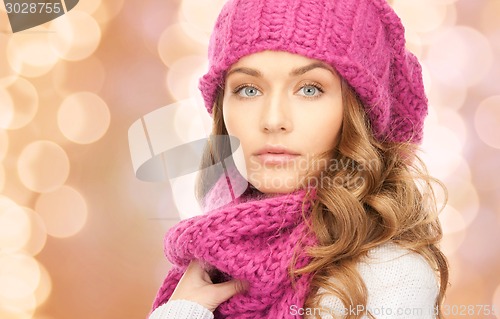 Image of close up of young woman in winter clothes