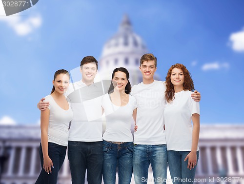 Image of group of smiling teenagers in white blank t-shirts