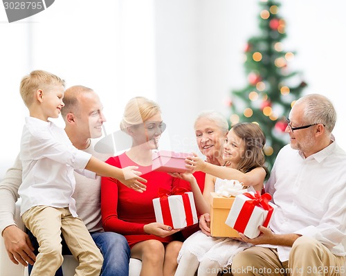 Image of smiling family with gifts