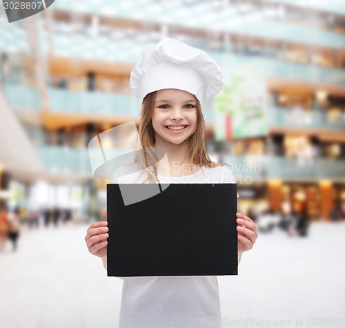 Image of little cook or baker with blank black paper