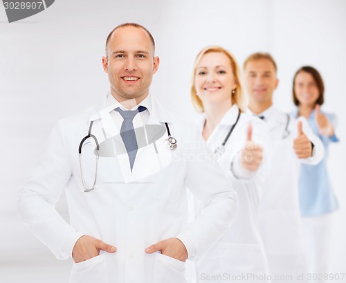 Image of smiling male doctor with stethoscope