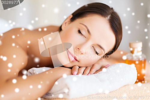 Image of beautiful young woman in spa