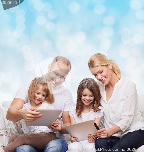 Image of happy family with tablet pc computers