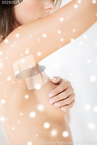 Image of close up of beautiful woman standing in towel