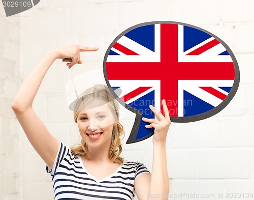 Image of smiling woman with text bubble of british flag