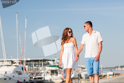 Image of smiling couple in city