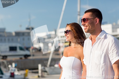 Image of smiling couple in city