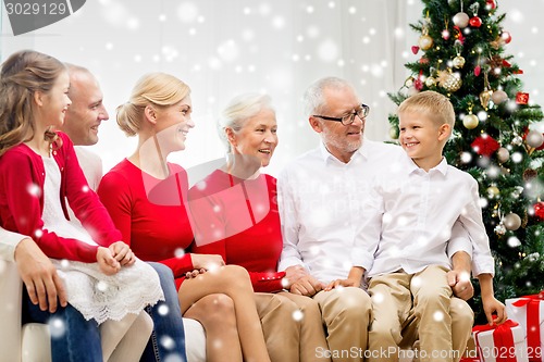 Image of smiling family at home