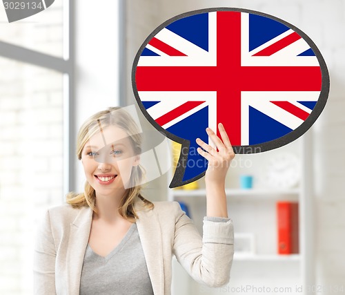 Image of smiling woman with text bubble of british flag
