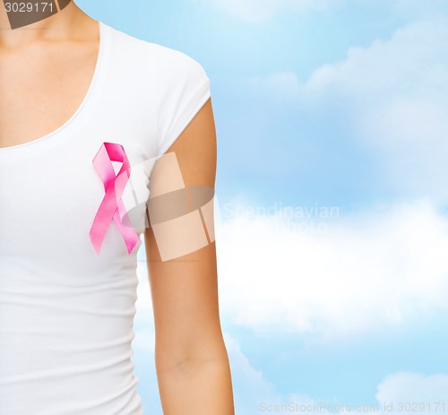 Image of close up of woman with cancer awareness ribbon