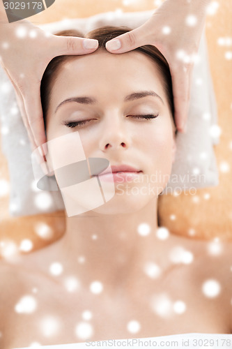 Image of beautiful young woman in spa