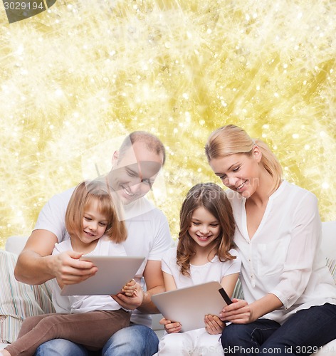 Image of happy family with tablet pc computers