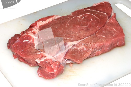 Image of Photo of the juicy beef meat on a cutting board