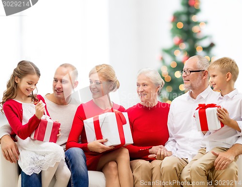 Image of smiling family with gifts