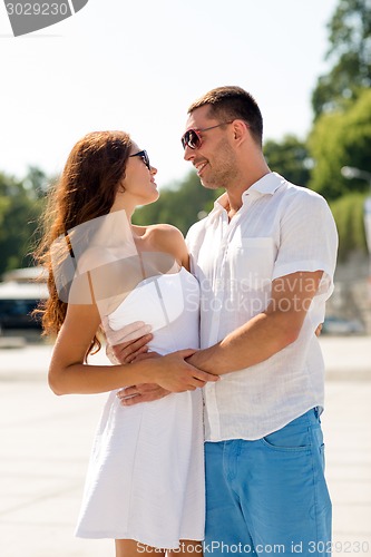 Image of smiling couple in city