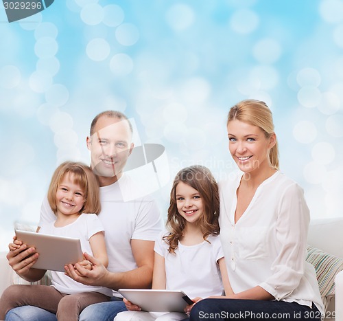 Image of happy family with tablet pc computers