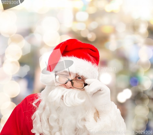 Image of close up of santa claus winking