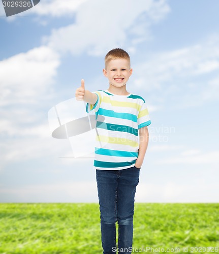 Image of little boy in casual clothes with arms crossed