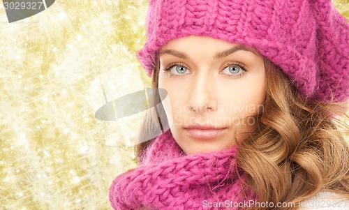 Image of close up of young woman in winter clothes