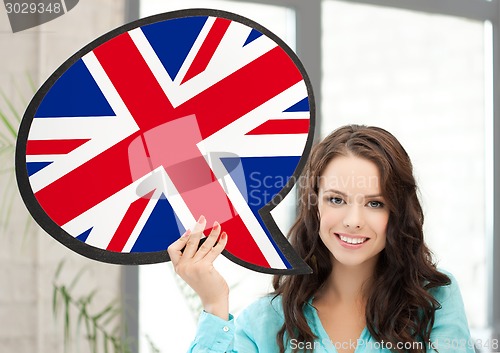 Image of smiling woman with text bubble of british flag