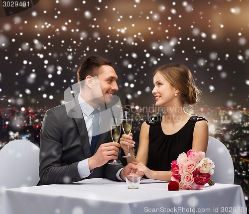 Image of smiling couple at restaurant