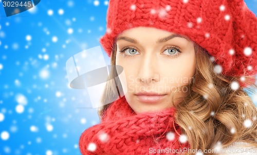 Image of close up of young woman in winter clothes