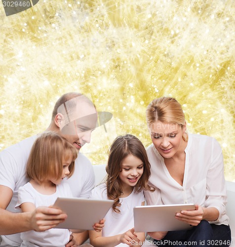 Image of happy family with tablet pc computers