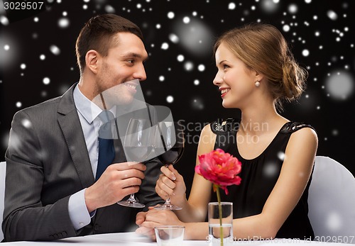 Image of smiling couple at restaurant