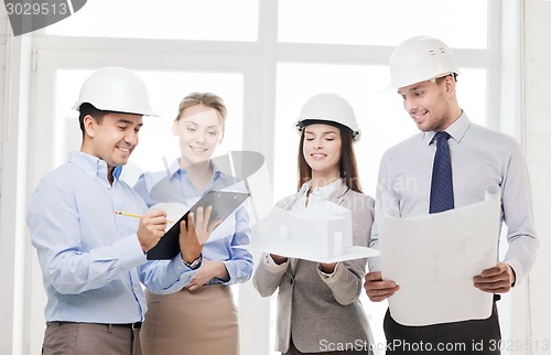 Image of happy business team in office