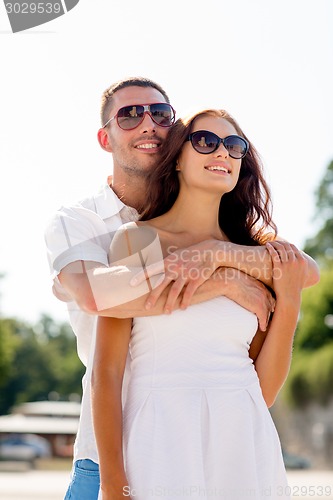 Image of smiling couple in city