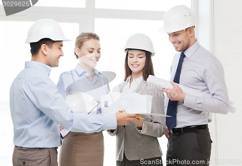 Image of happy business team in office