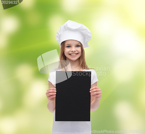 Image of little cook or baker with blank black paper