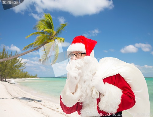 Image of man in costume of santa claus with bag