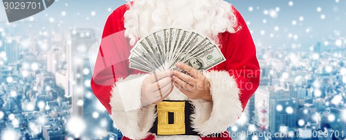 Image of close up of santa claus with euro money