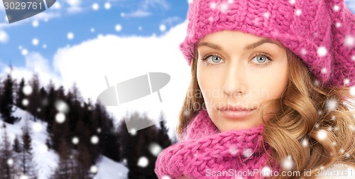 Image of close up of young woman in winter clothes