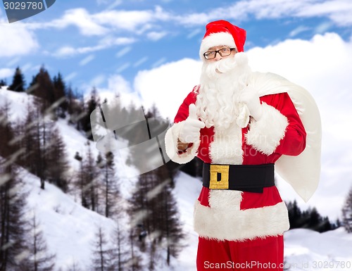 Image of man in costume of santa claus with bag