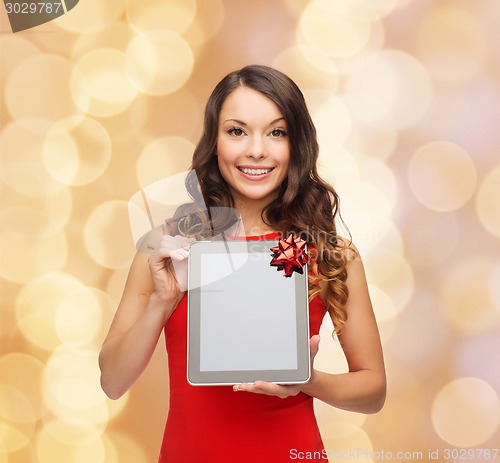 Image of smiling woman with tablet pc